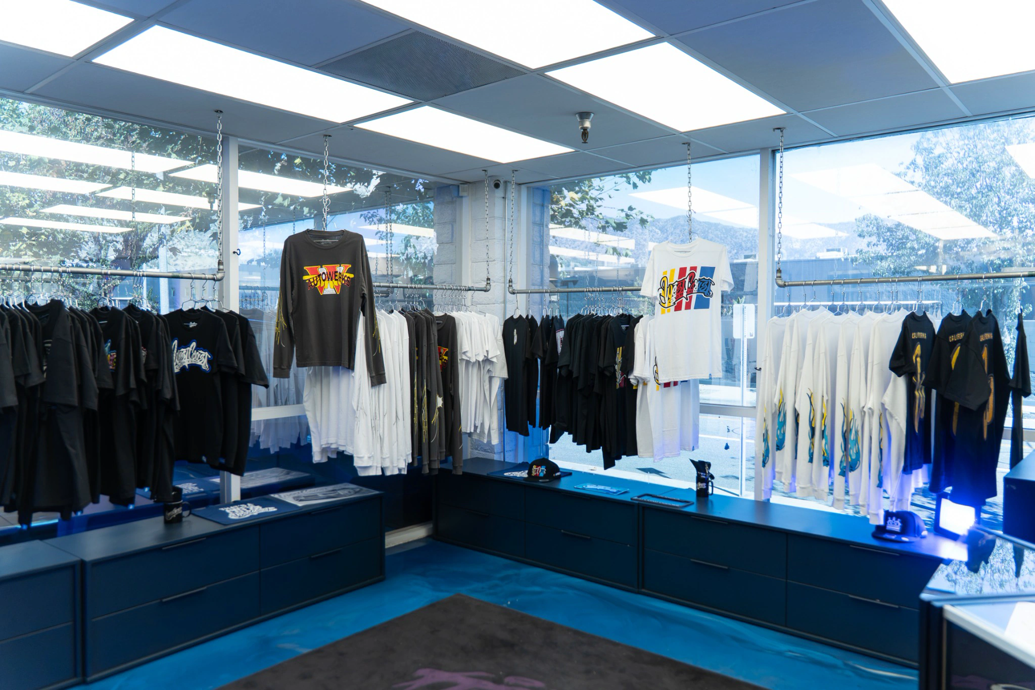 West Coast Customs merchandise shop with apparel on display